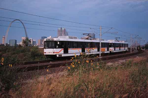 Metro Link in East St. Louis with Arch and Flowers