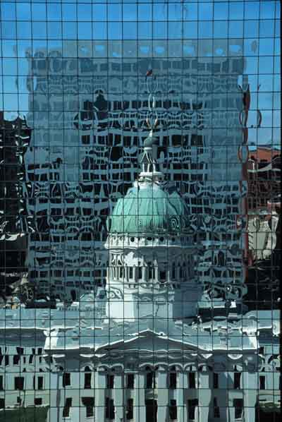 Reflection of Old Courthouse in Equitable Building Tight