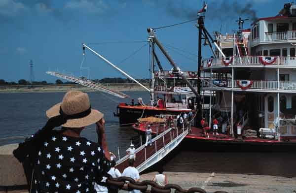 Woman Watching Delta Queen