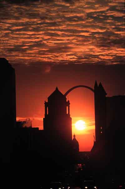 Sunrise with Full Ball of Sun and St. Louis Skyline Silhouette